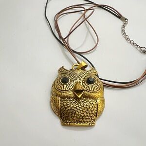 ❣️SOLD❣️Owl gold tone with black brown rubber cord necklace